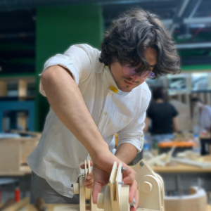 industrial design student prepares a project in the workshop